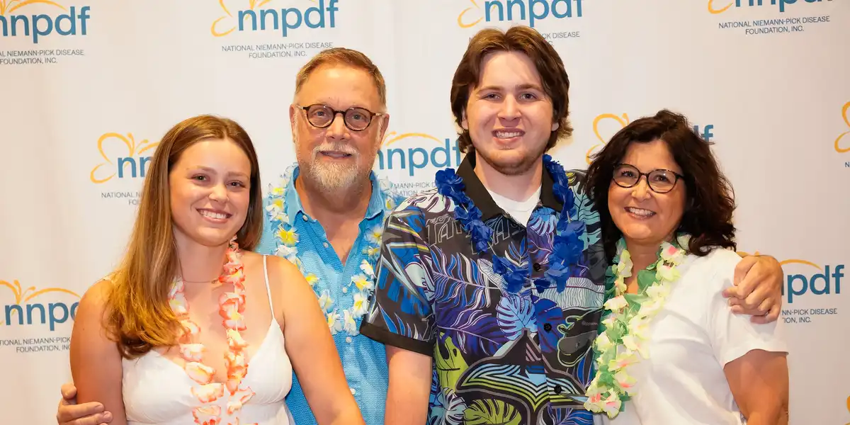 A family in leis at the NNPDF Family Support and Medical Conference