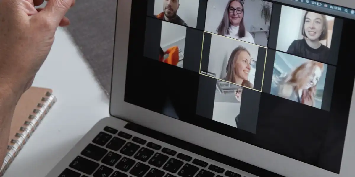 A video call with several parents on a laptop screen